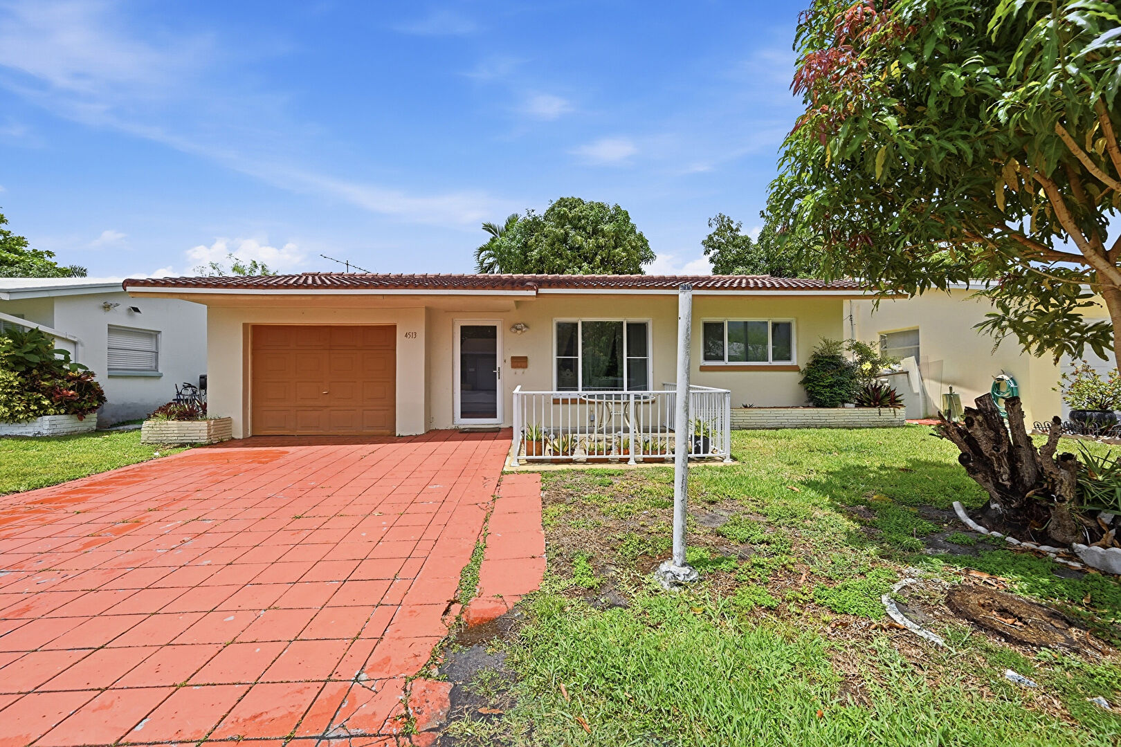 Front at 4513 Northwest 49th Street, Tamarac, FL 33319, listed by Eugene Valdes
