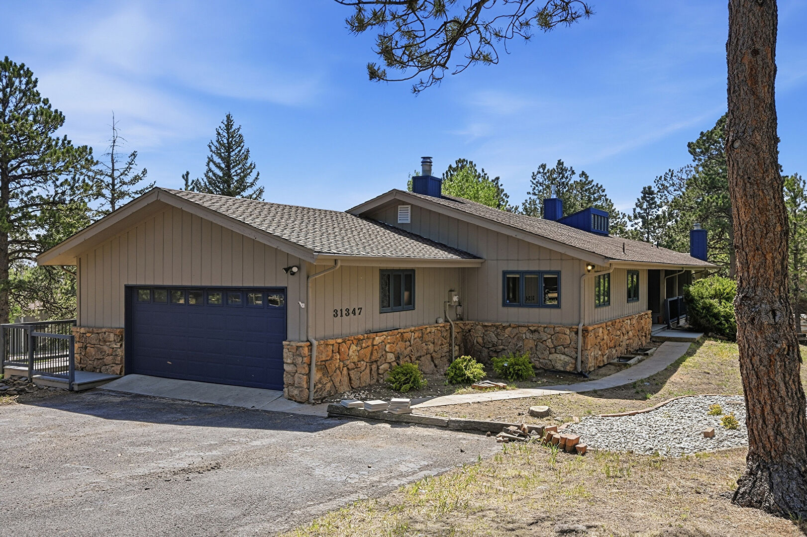 Front at 30347 Tamarisk Lane, Evergreen, CO 80439, listed by Cheryl Hastings