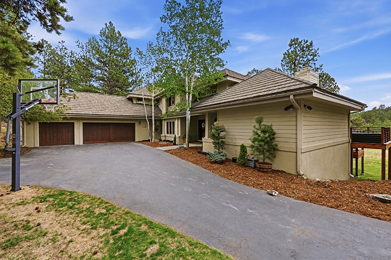 Front at 29596 Targhee Lane, Evergreen, CO 80439, listed by Sandra Bosworth
