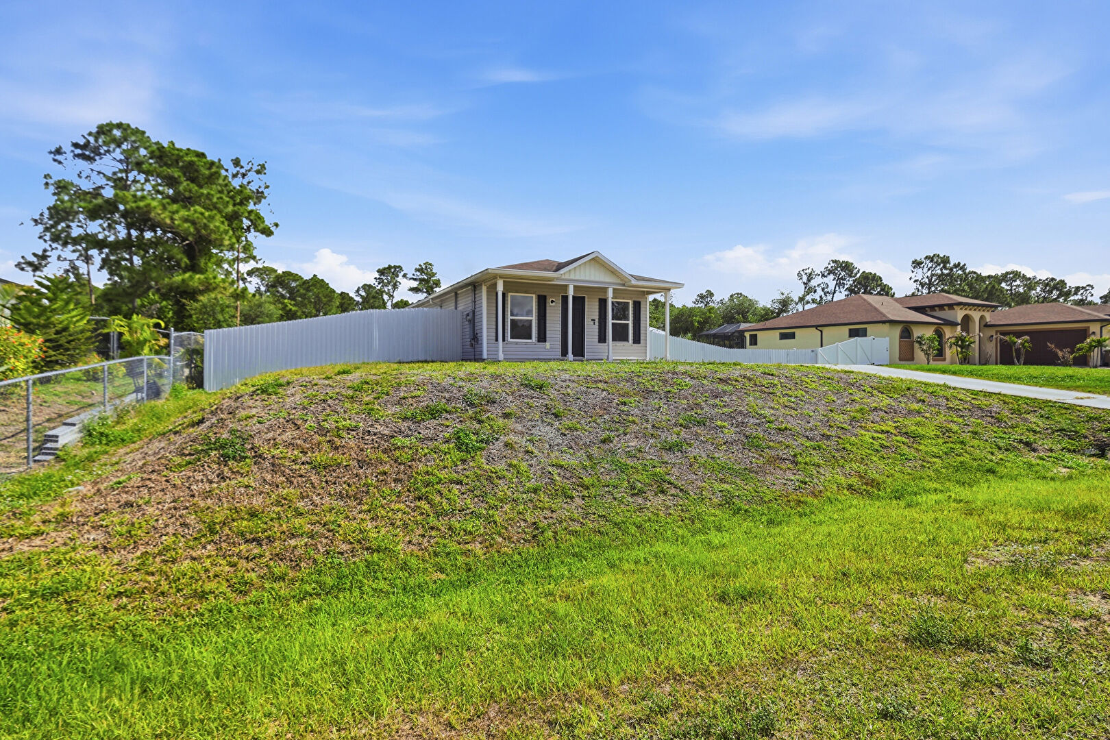 Front at 3824 17th Street West, Lehigh Acres, FL 33971, listed by Nelica Krekic