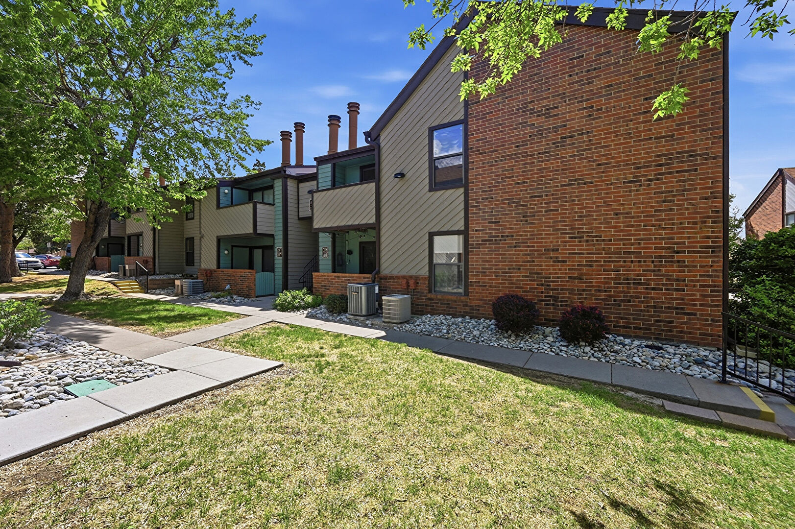 Front at 11925 East Harvard Avenue, #108, Aurora, CO 80014, listed by Troy Warrick, MLS ID: 5431394