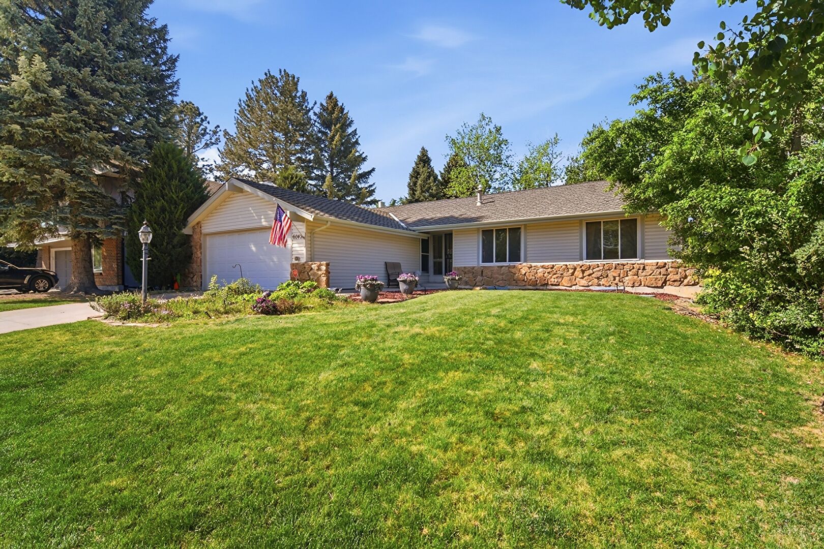 Front at 6043 South Glencoe Way, Centennial, CO 80121, listed by John Hauschild