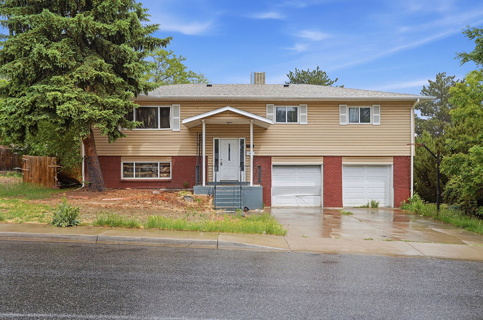 Front at 9840 North Pecos Street, Thornton, CO 80260, listed by Robert Gruber