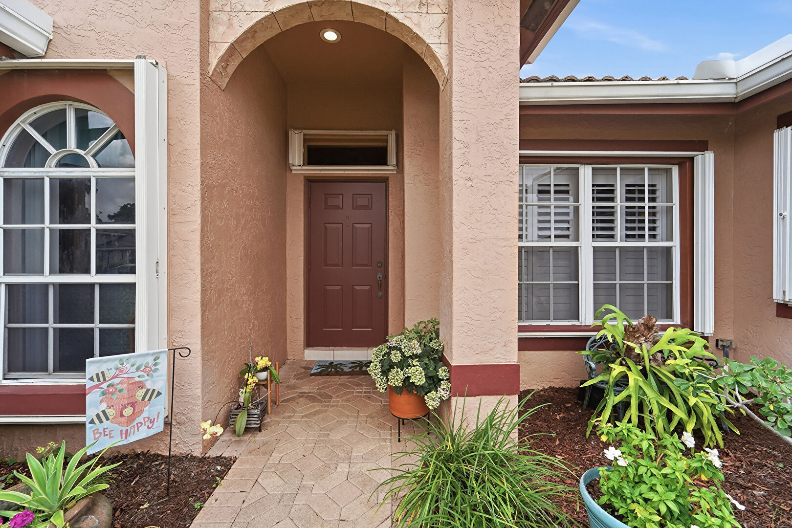 Exterior Entry at 4788 Cypress Dr S, Boynton Beach, FL 33436, listed by Macy Sedlacek