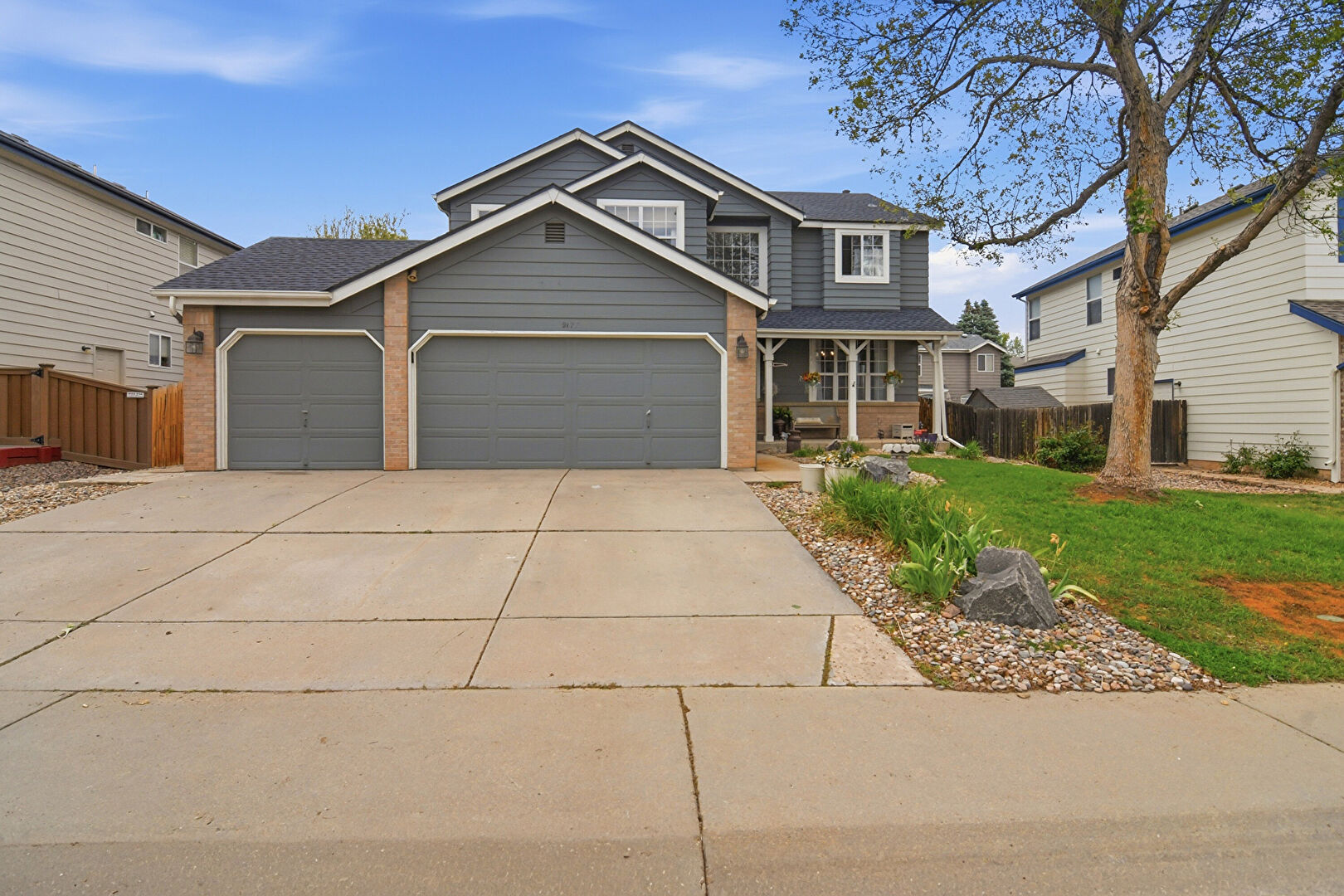 Front at 9177 West Rockland Place, Littleton, CO 80128, listed by Robert Gruber