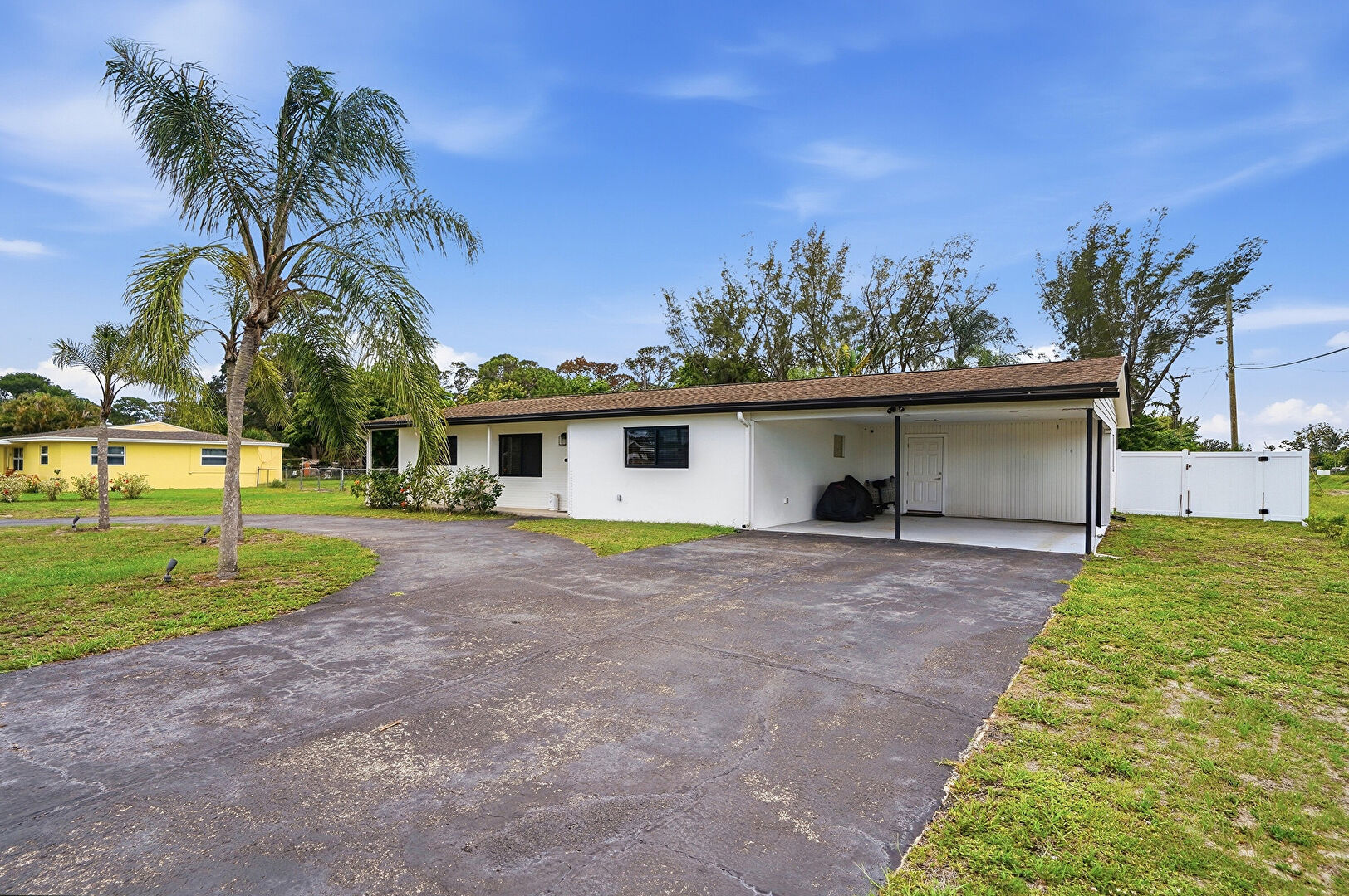 Front at 5470 Toronto Road, Haverhill, FL 33415, listed by Ileana Ramos