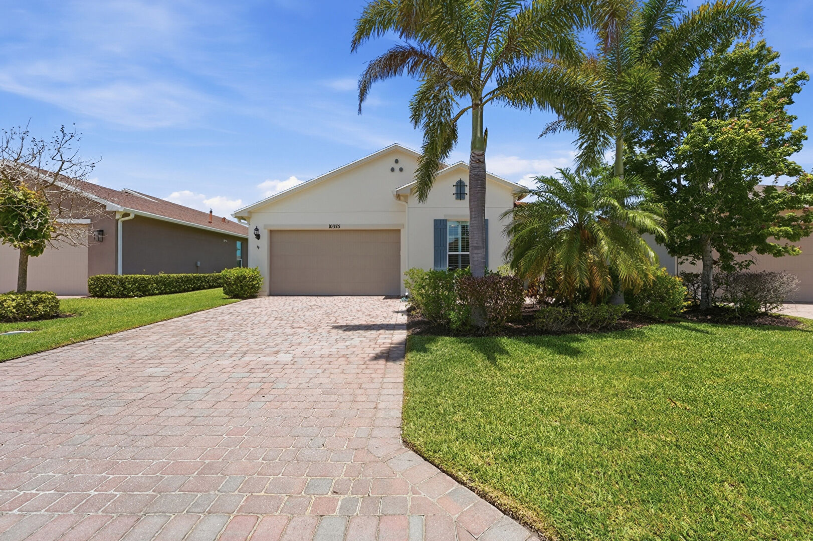 Front at 10375 Southwest Indian Lilac Trail, Port St. Lucie, FL 34987, listed by Jevene Caracello