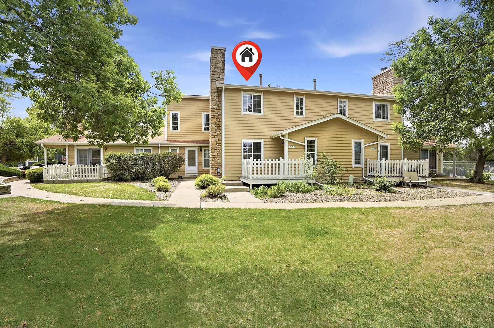Front at 8425 Everett Way, Unit C, Arvada, CO 80005, listed by Colleen Simpson