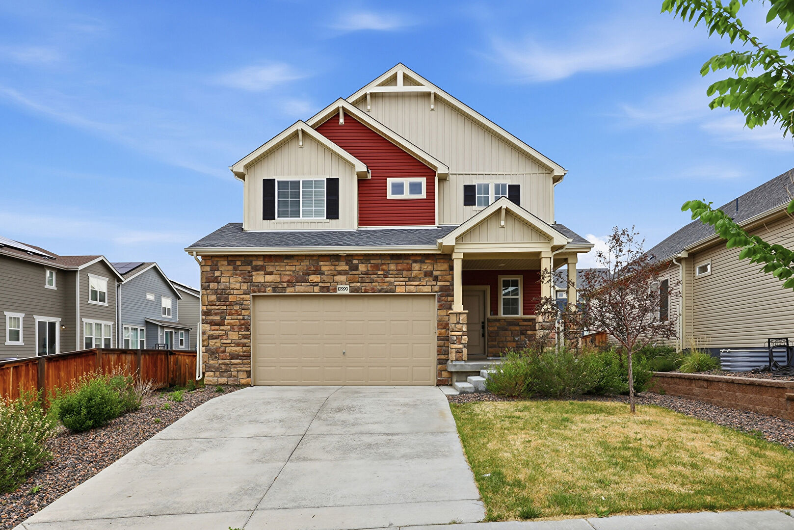 Front at 10990 Memphis Court, Commerce City, CO 80022, listed by Jordan Kermes