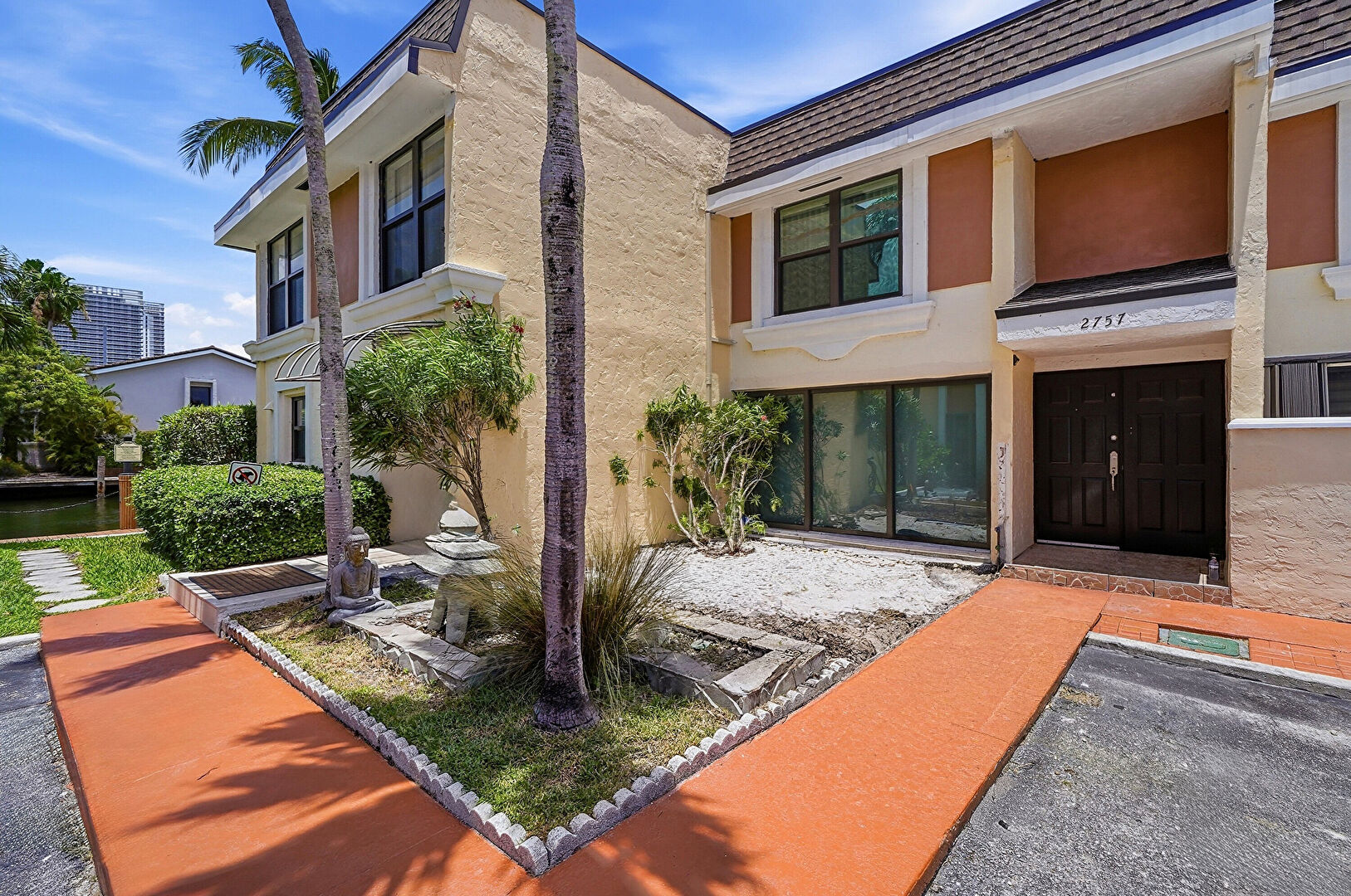 Front at 2757 Northeast 165th Terrace unit 28, North Miami Beach, FL 33160, listed by Karin Echevarria