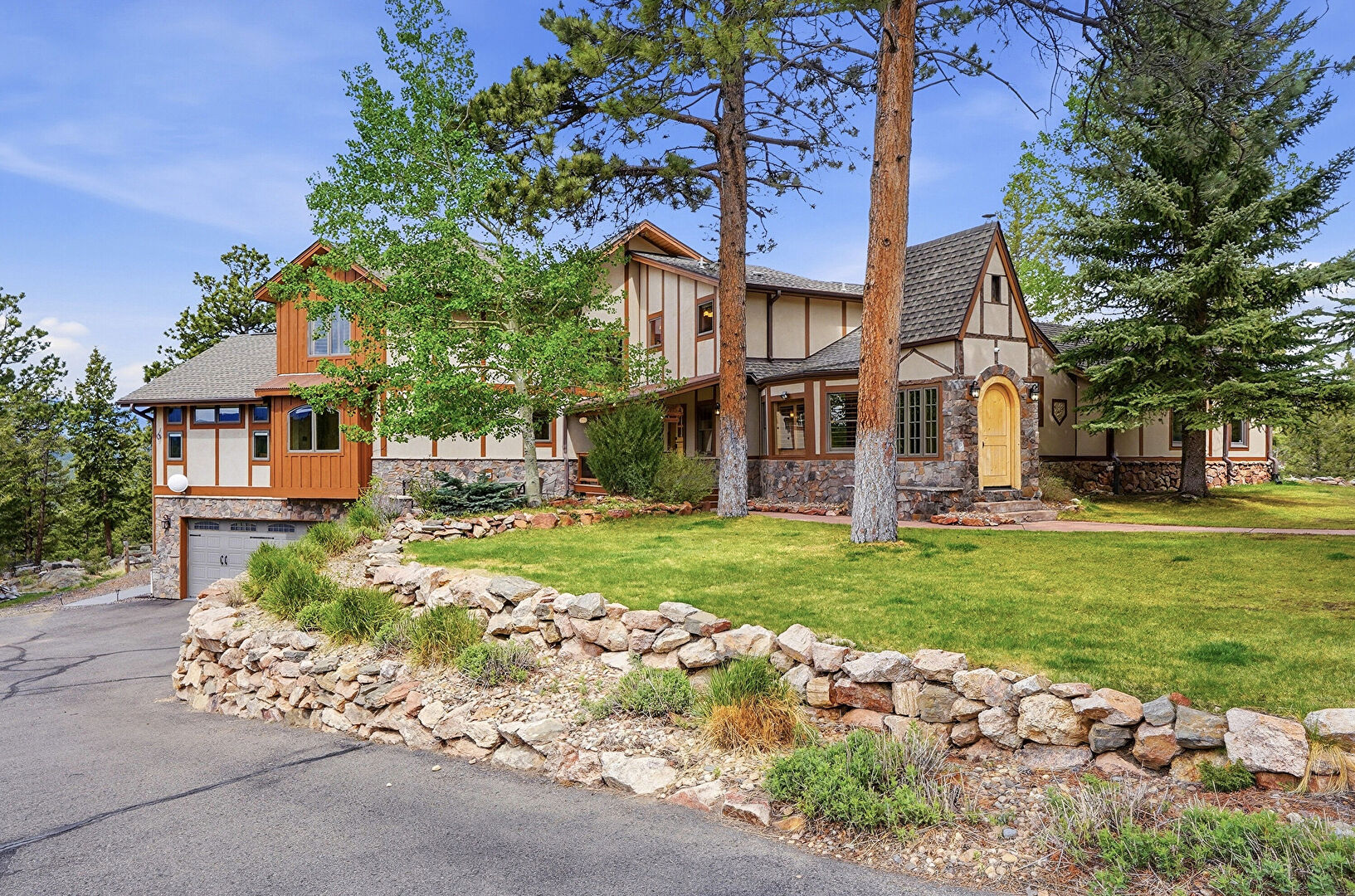 Front at 15073 South Wandcrest Drive, Pine, CO 80470, listed by K.C. Golfinopoulos