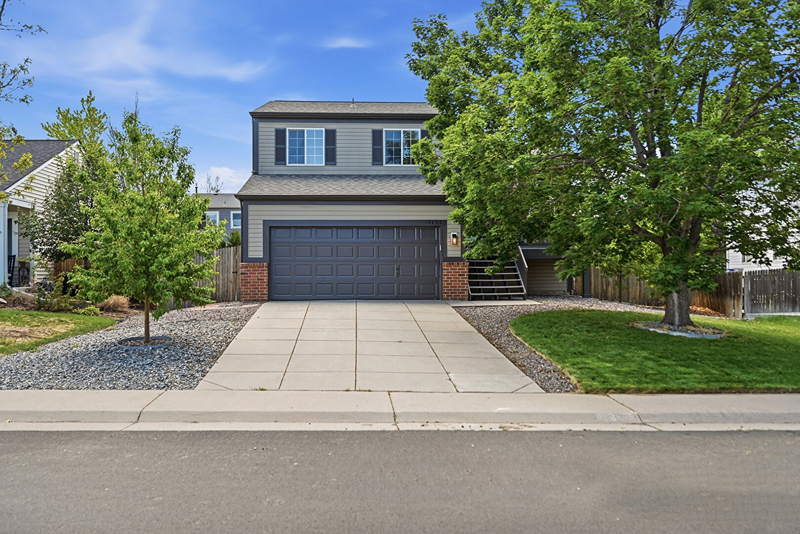 Front at 19036 East Ithaca Place, Aurora, CO 80013, listed by Benjamin (Ben) Vonderwahl