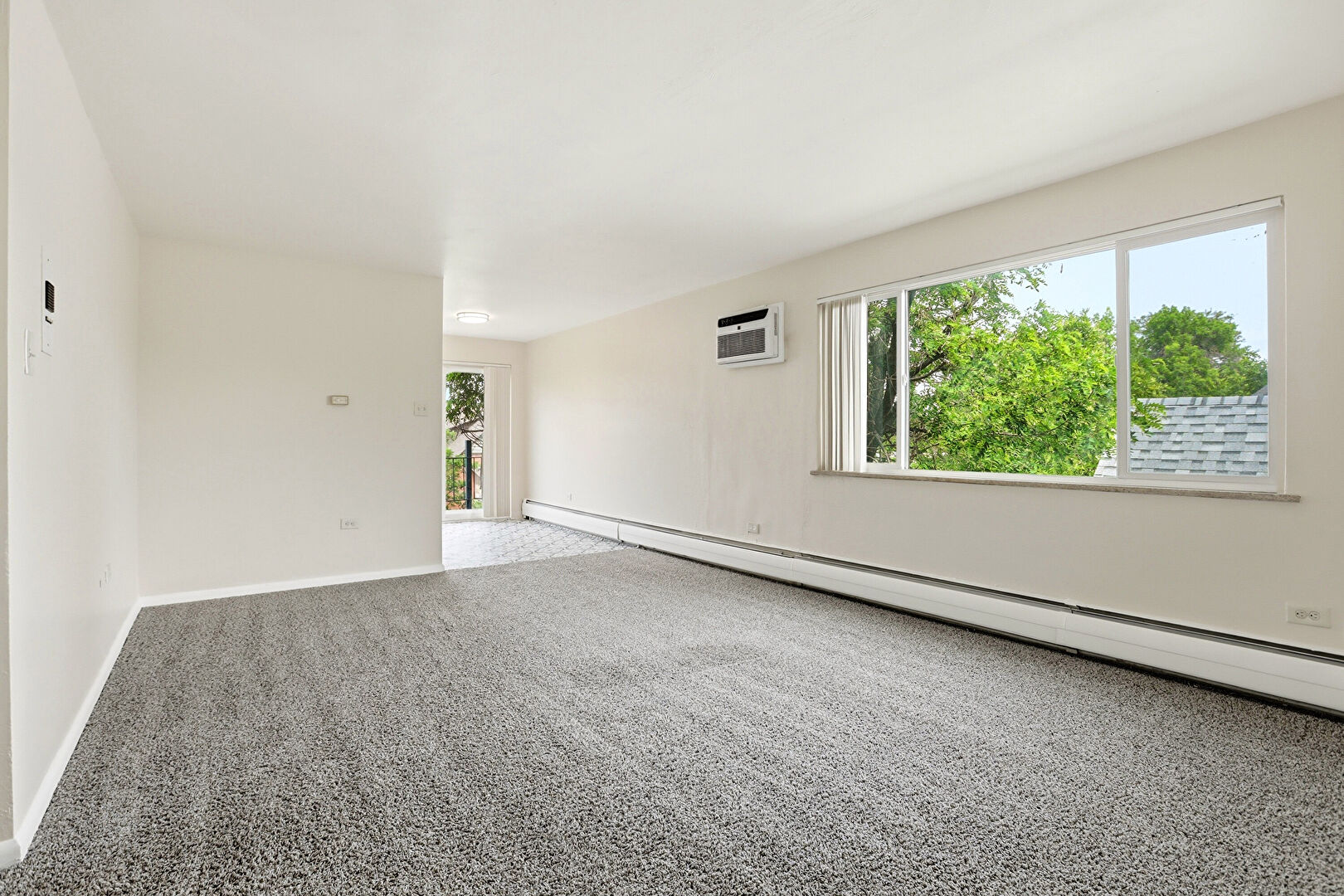 Living Room at 234 Lincoln Street, Unit 9, Denver, CO 80203, listed by Brenna Frane