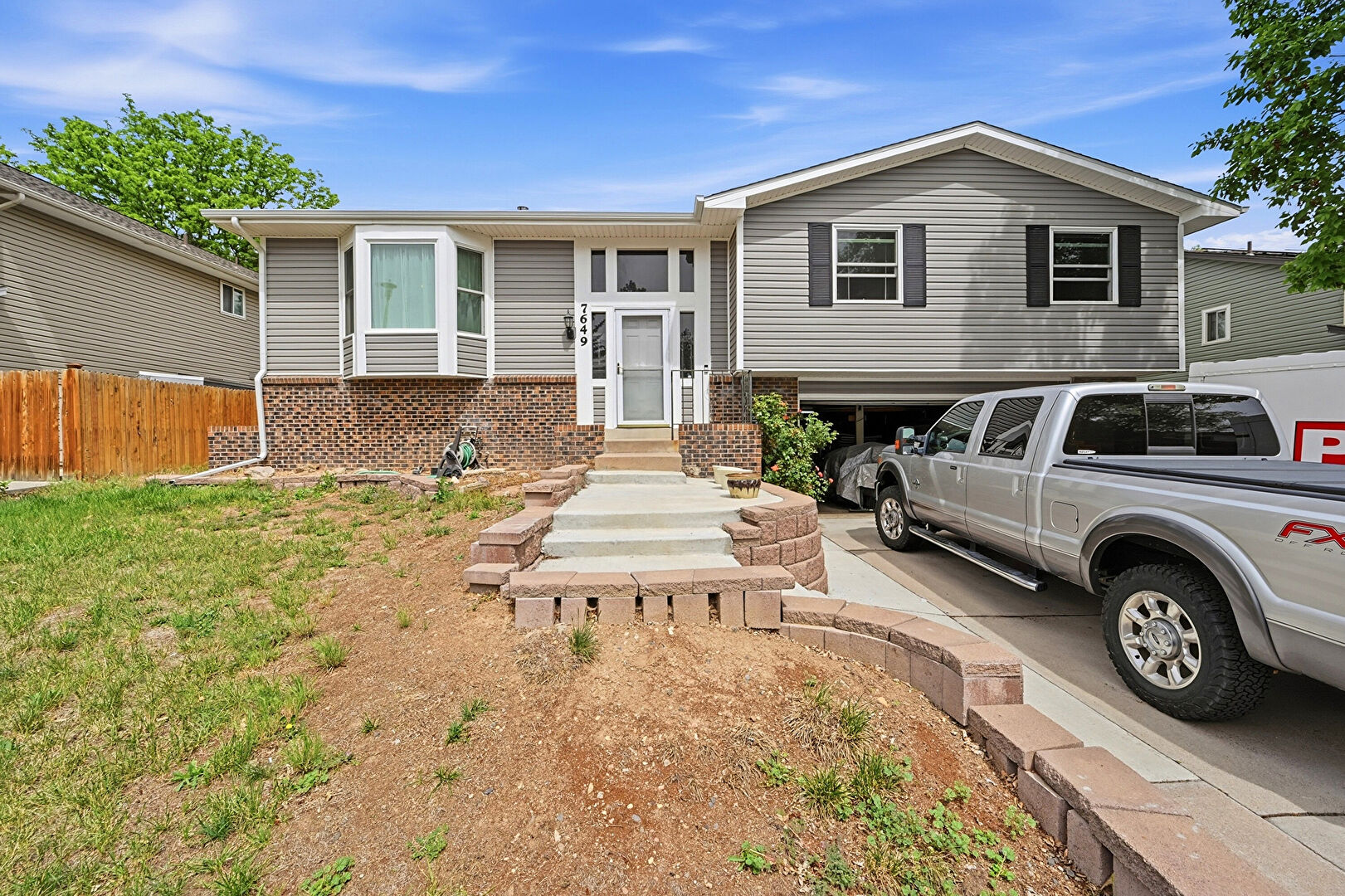 Front at 7649 West Frost Drive, Littleton, CO 80128, listed by Rhonda Haefele, MLS ID: 9811235