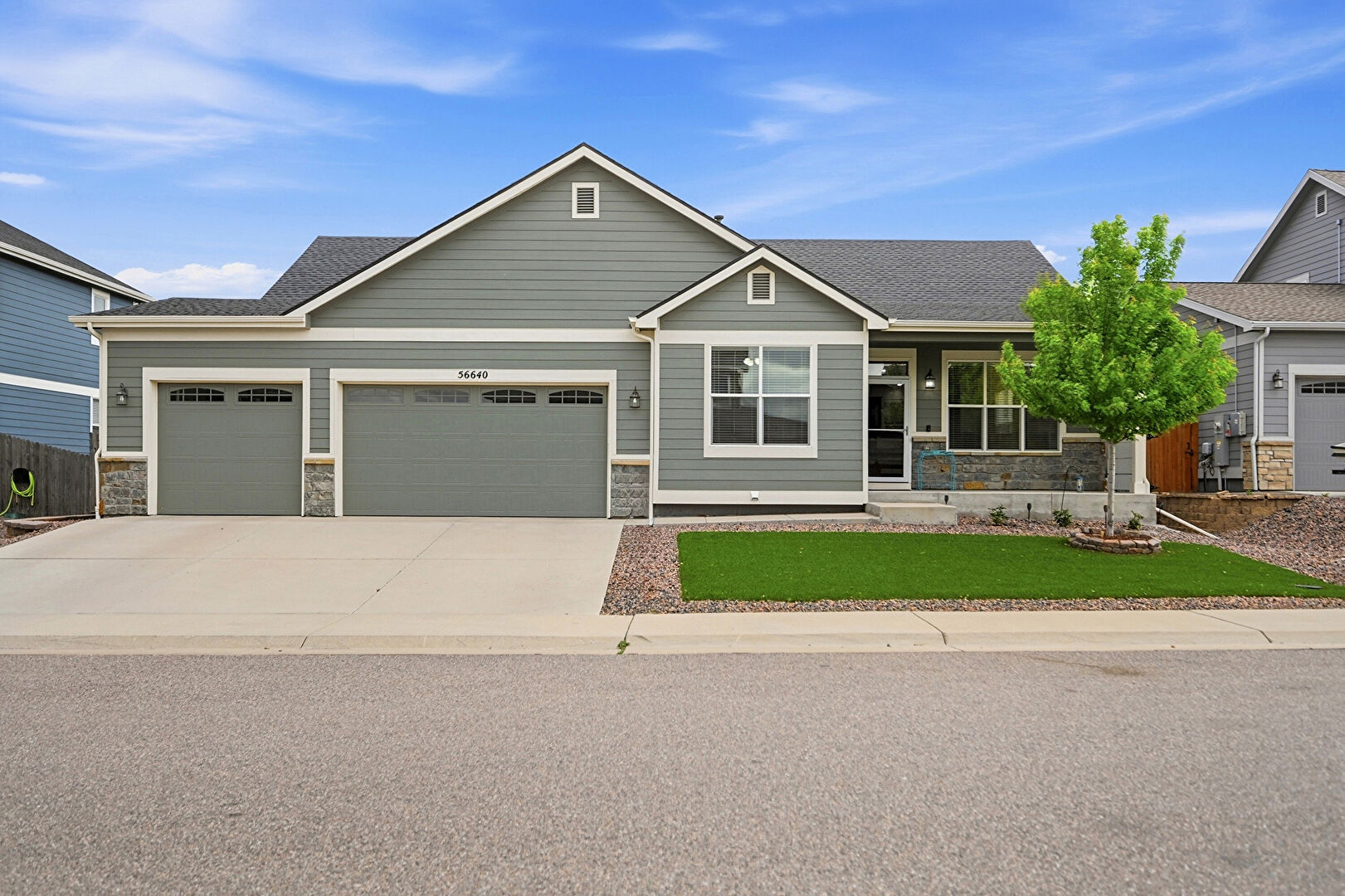 Front at 56640 East 23rd Place, Strasburg, CO 80136, listed by Lauren Wilson