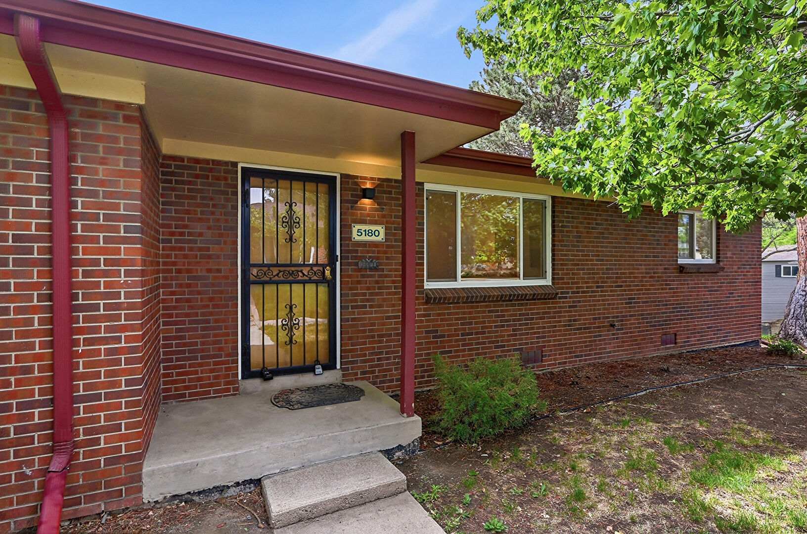 Exterior Entry at 5180 e asbury avenue, Denver, CO 80222, listed by Lauren Wilson