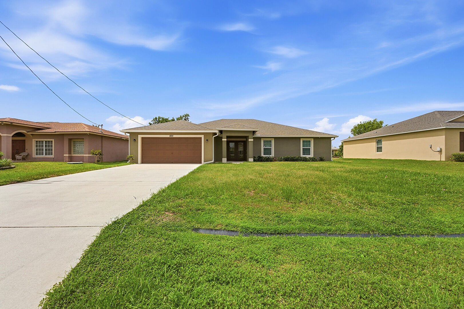 Front at 1692 Southwest Alvaton Avenue, Port St. Lucie, FL 34953, listed by Jason M Coley