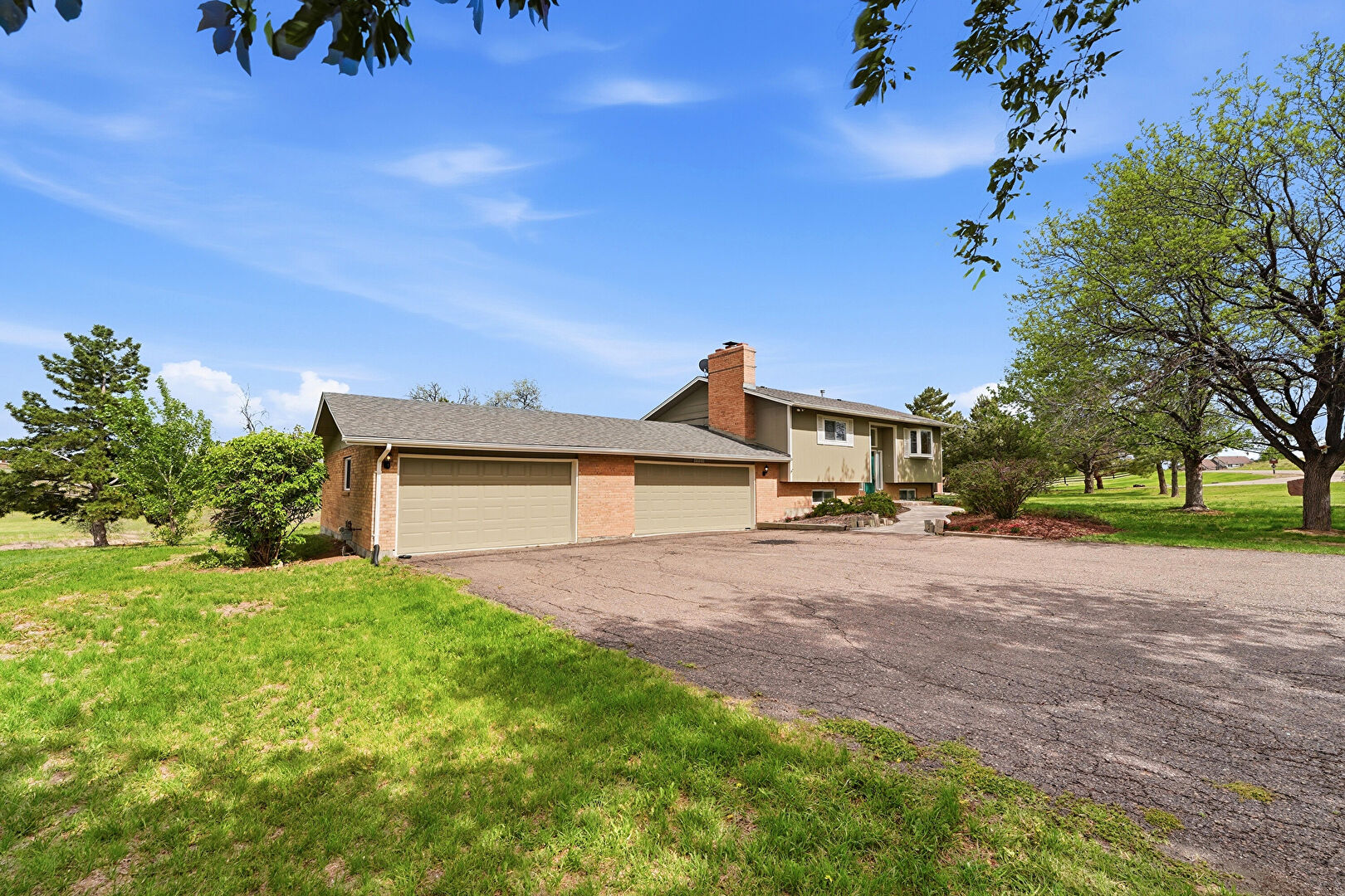 Front at 6966 South Gibraltar Street, Centennial, CO 80016, listed by Ted Peterson Care Real Estate