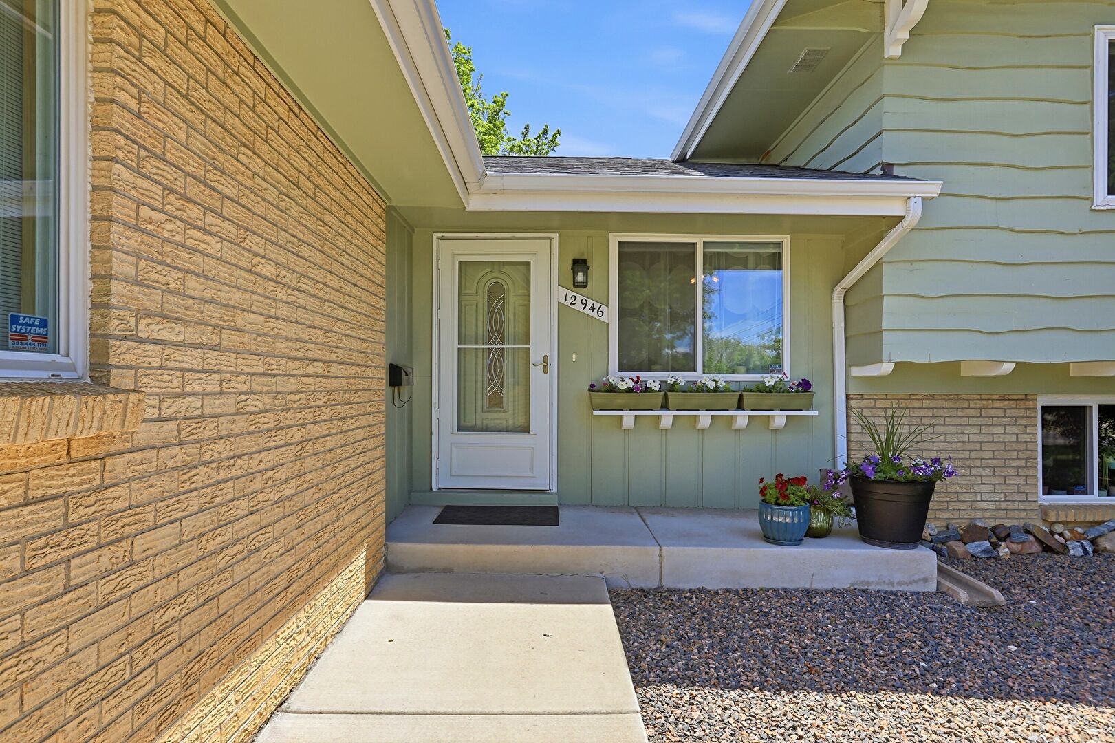 Exterior Entry at 12946 East 2nd Avenue, Aurora, CO 80011, listed by Mike Conner