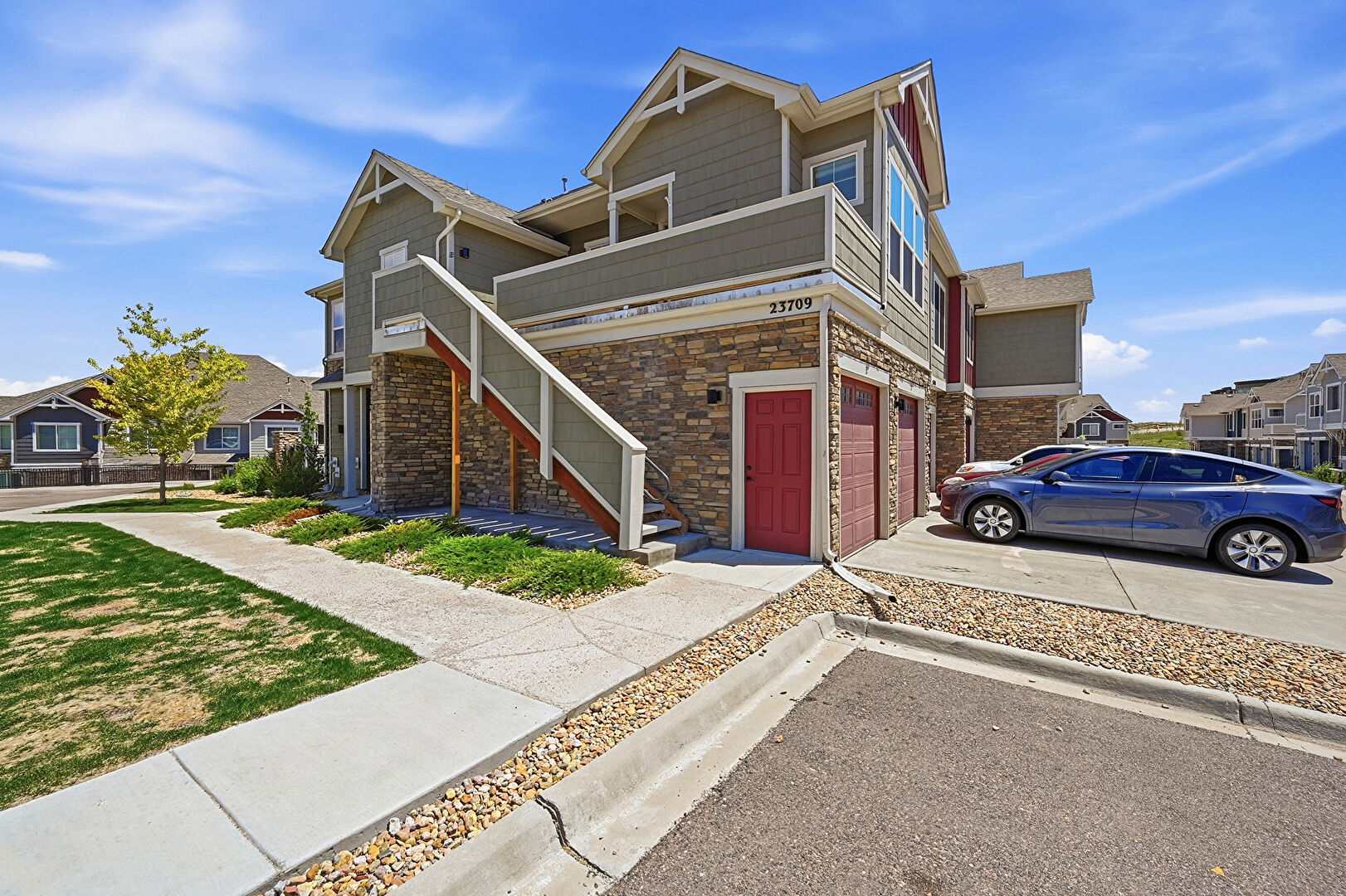 Front at 23709 East Ida Drive, Unit E, Aurora, CO 80016, listed by Jerry Haberkorn