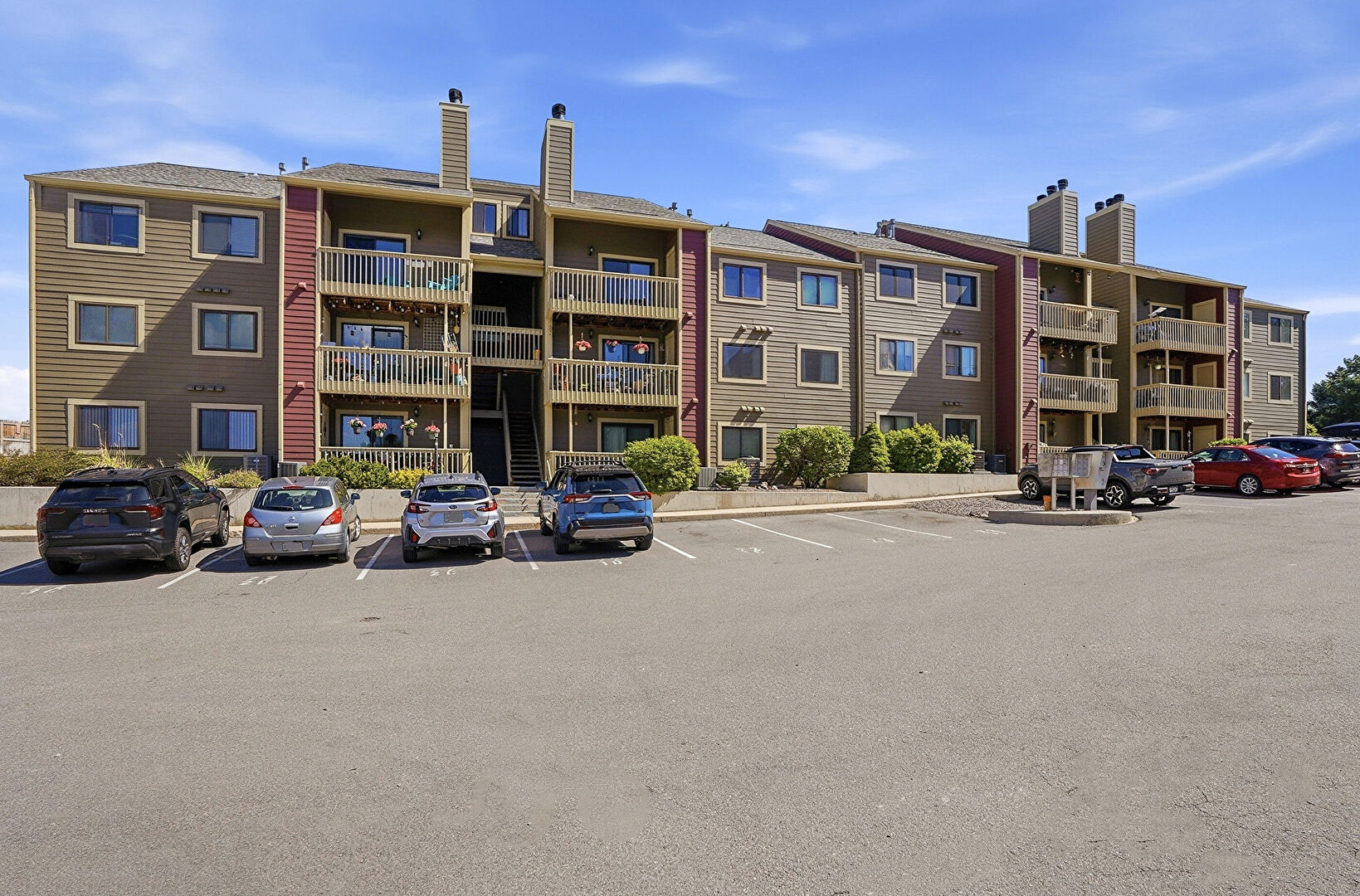 Front at 10872 West Evans Avenue, Unit 3E, Lakewood, CO 80227, listed by Motenia Rose- Deaver
