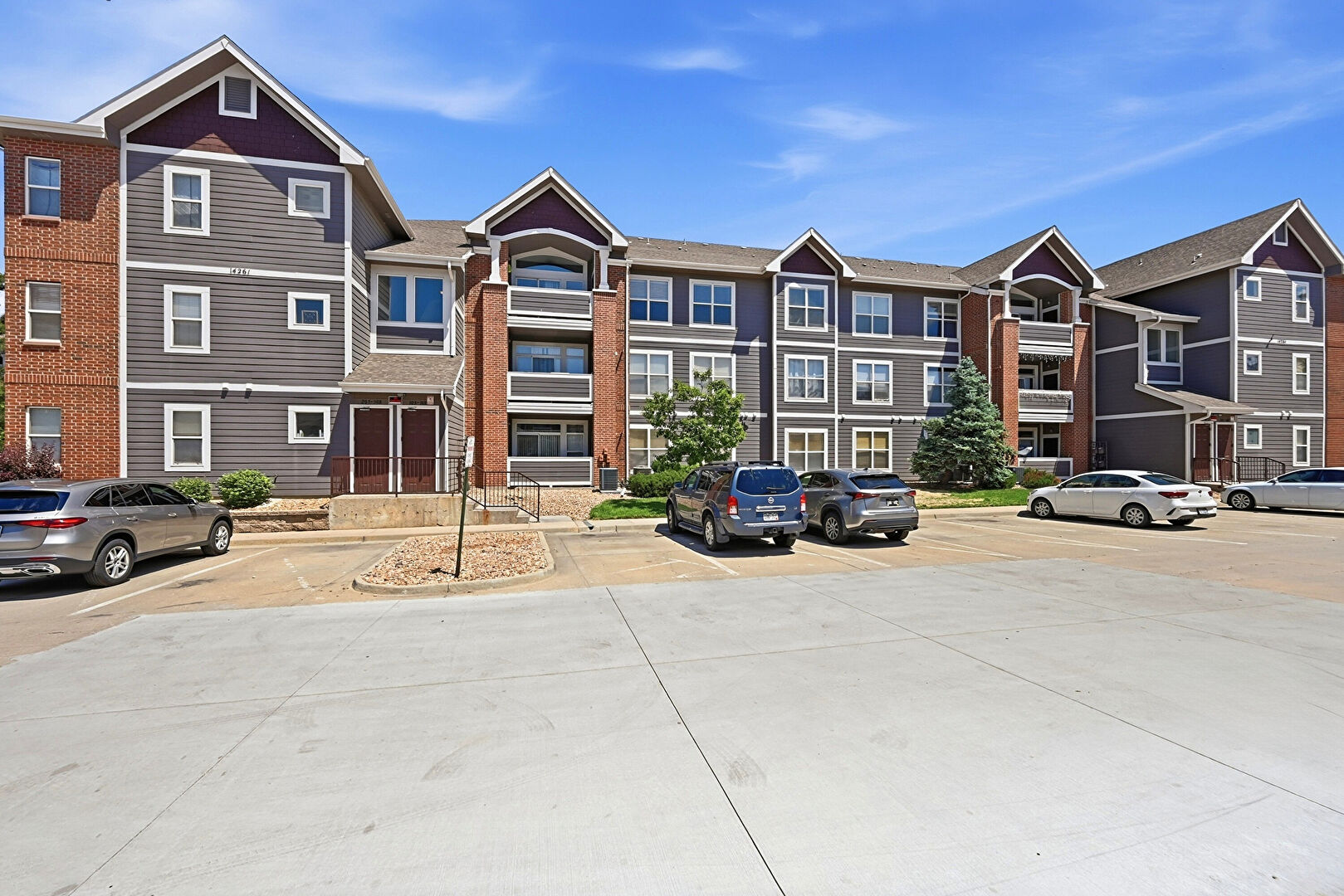 Front at 14261 e 1st dr #108, aurora, CO 80011, listed by Aster Waldu