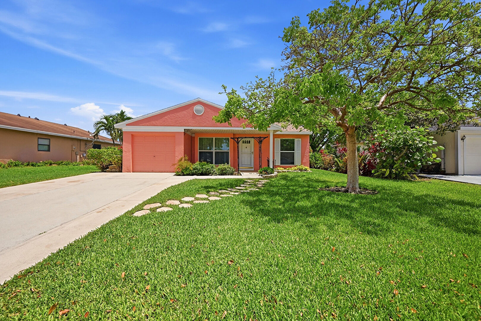 Front yard at 8131 Country Park Drive, Boca Raton, FL 33433, listed by Marleen Ayton