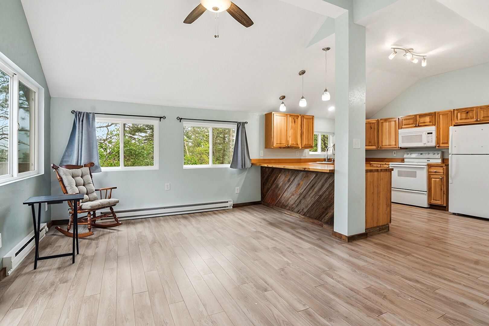 Living Room at 26339 Pleasant Park Road, Conifer, CO 80433, listed by Leigh Ann Jordan