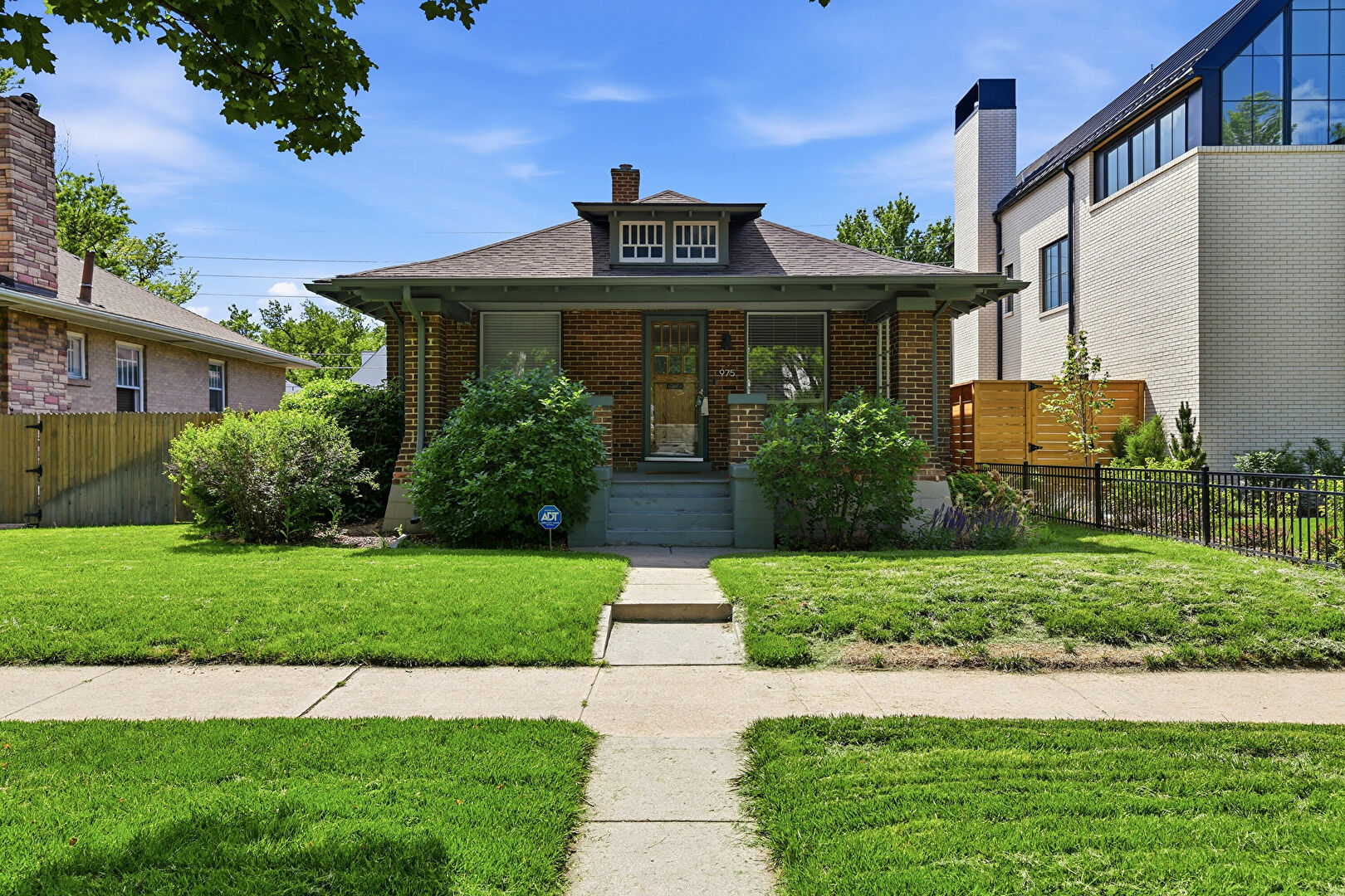 Front at 975 South Vine Street, Denver, CO 80209, listed by Taylor Haas