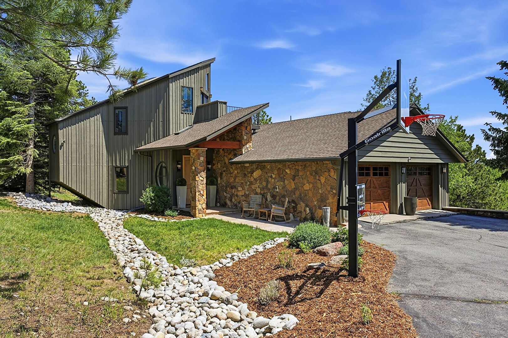 Front at 2890 Interlocken Drive, Evergreen, CO 80439, listed by Sandra Bosworth