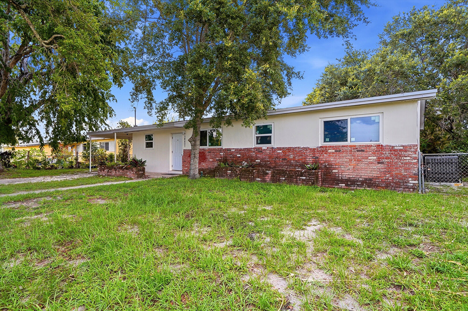 Front at 18431 Northwest 39th Court, Miami Gardens, FL 33055, listed by Ana Garcia
