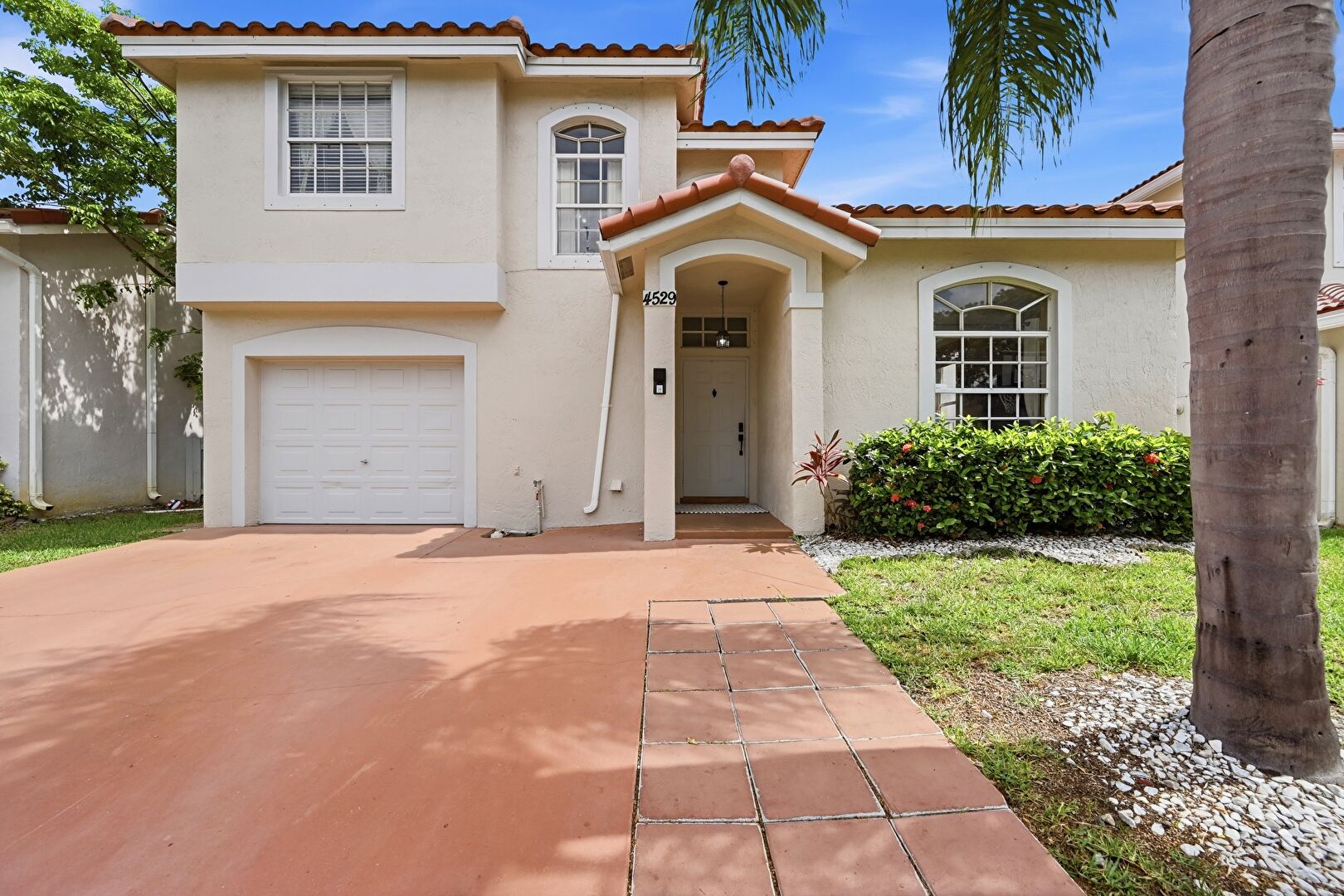 Front at 4529 Northwest 60th Court, Coconut Creek, FL 33073, listed by Taylor London