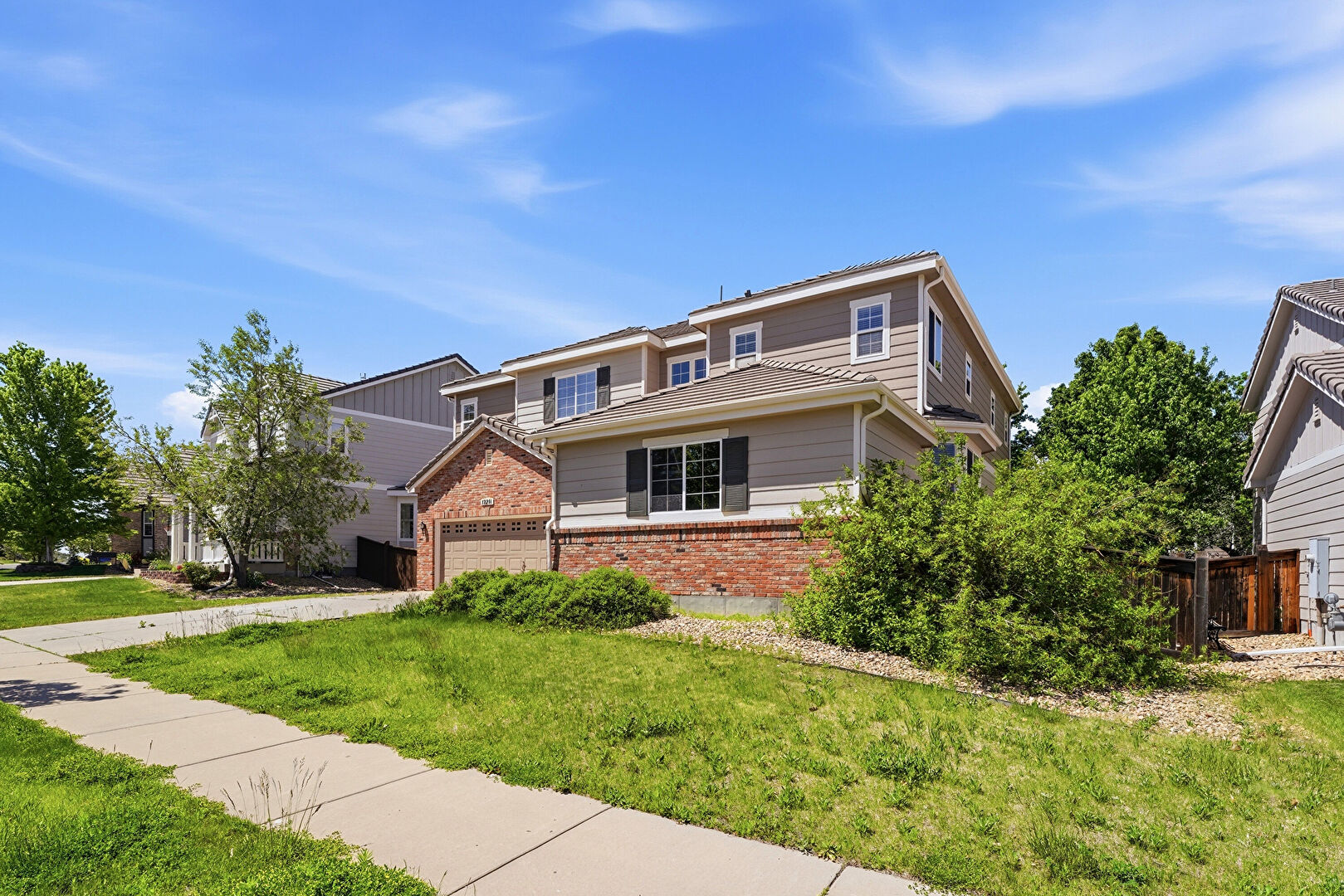 Front at 12211 S Grass River Trail, Parker, CO 80134, listed by Taylor Haas