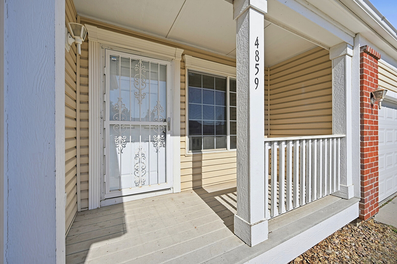 Exterior Entry at 4859 Joplin Court, Denver, CO 80239, listed by Taylor Haas