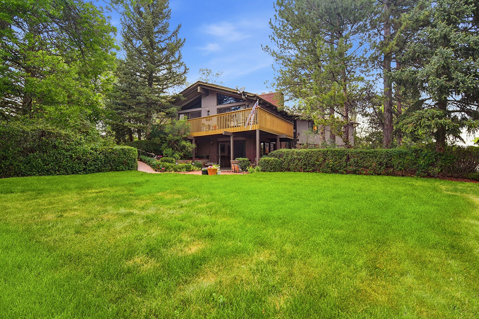 Front at 4665 South Sheridan Boulevard, Bow Mar, CO 80123, listed by Ted Baer