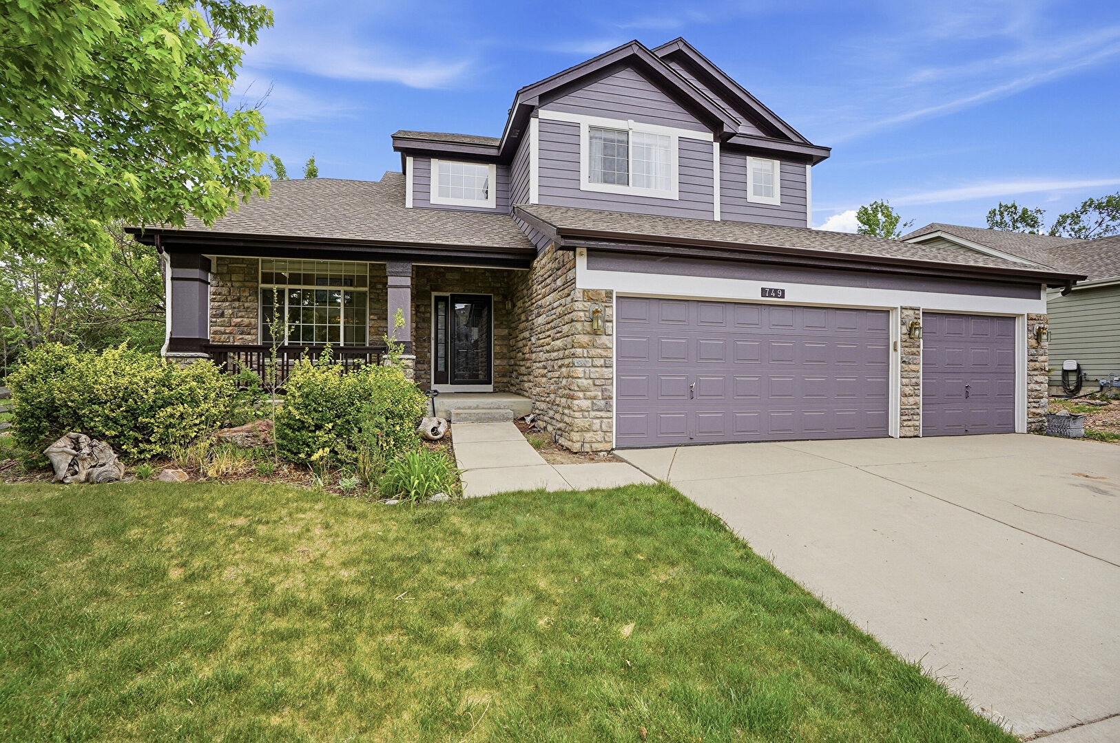 Front at 749 Pope Drive, Erie, CO 80516, listed by Lorrie and Troy Lucero