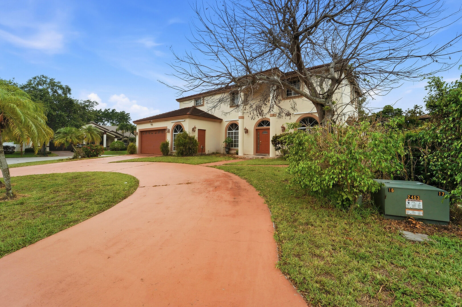 Front at 10710 Northwest 54th Place, Coral Springs, FL 33076, listed by Charilee Rivera