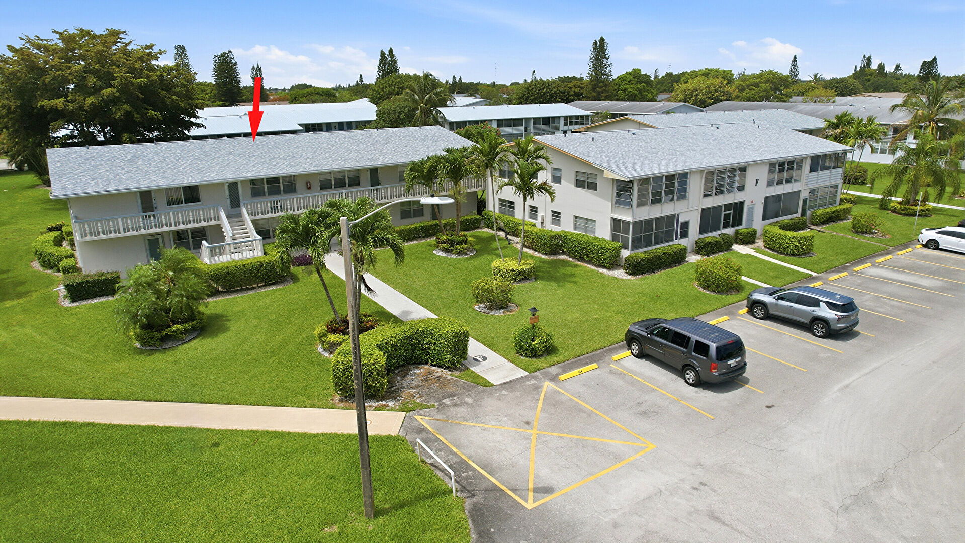 Aerial View at 143 Cambridge F, West Palm Beach, FL 33417, listed by Larry Mastropieri