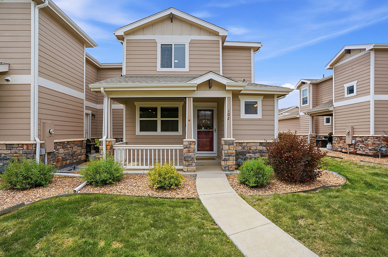 Front at 6104 Summit Peak Court, Unit 102, Erie, CO 80516, listed by Amanda Lam