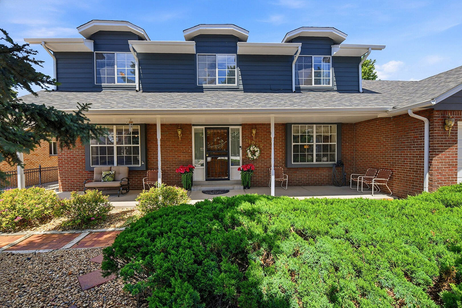 Front at 11039 East Colorado Drive, Aurora, CO 80012, listed by Carl Dire