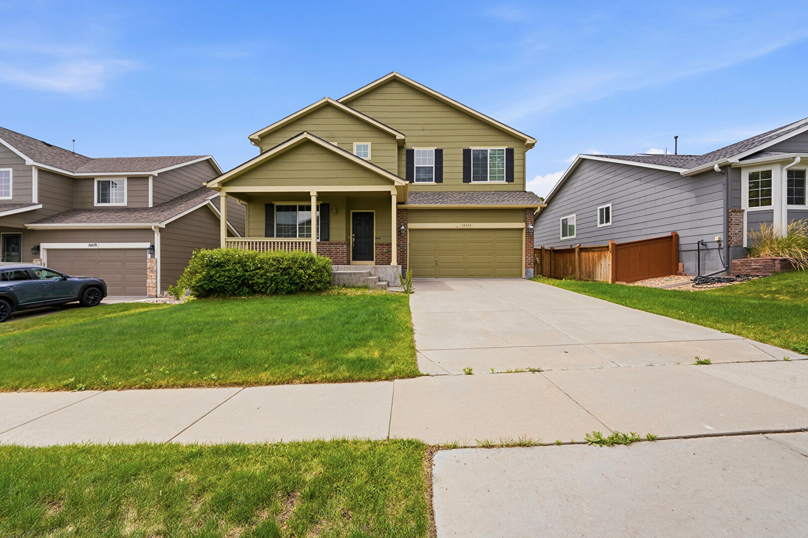 Front at 16664 East Prairie Wind Avenue, Parker, CO 80134, listed by Taylor Haas