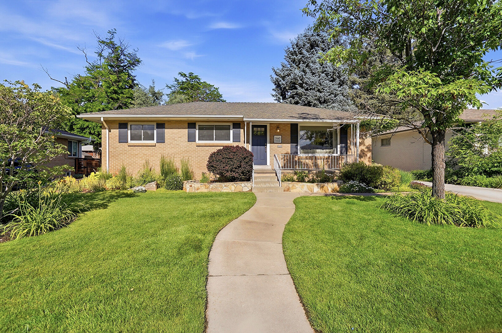Front at 3160 South Humboldt Street, Englewood, CO 80113, listed by Britt Armstrong