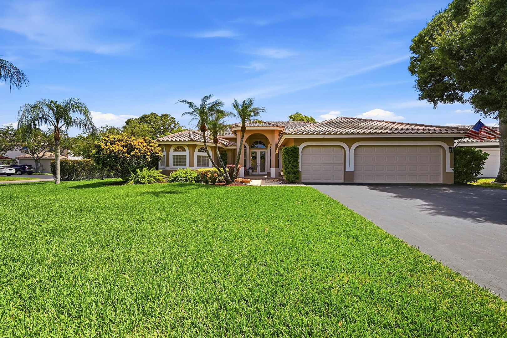 Front at 4942 Northwest 110th Way, Coral Springs, FL 33076, listed by Laura Sanders