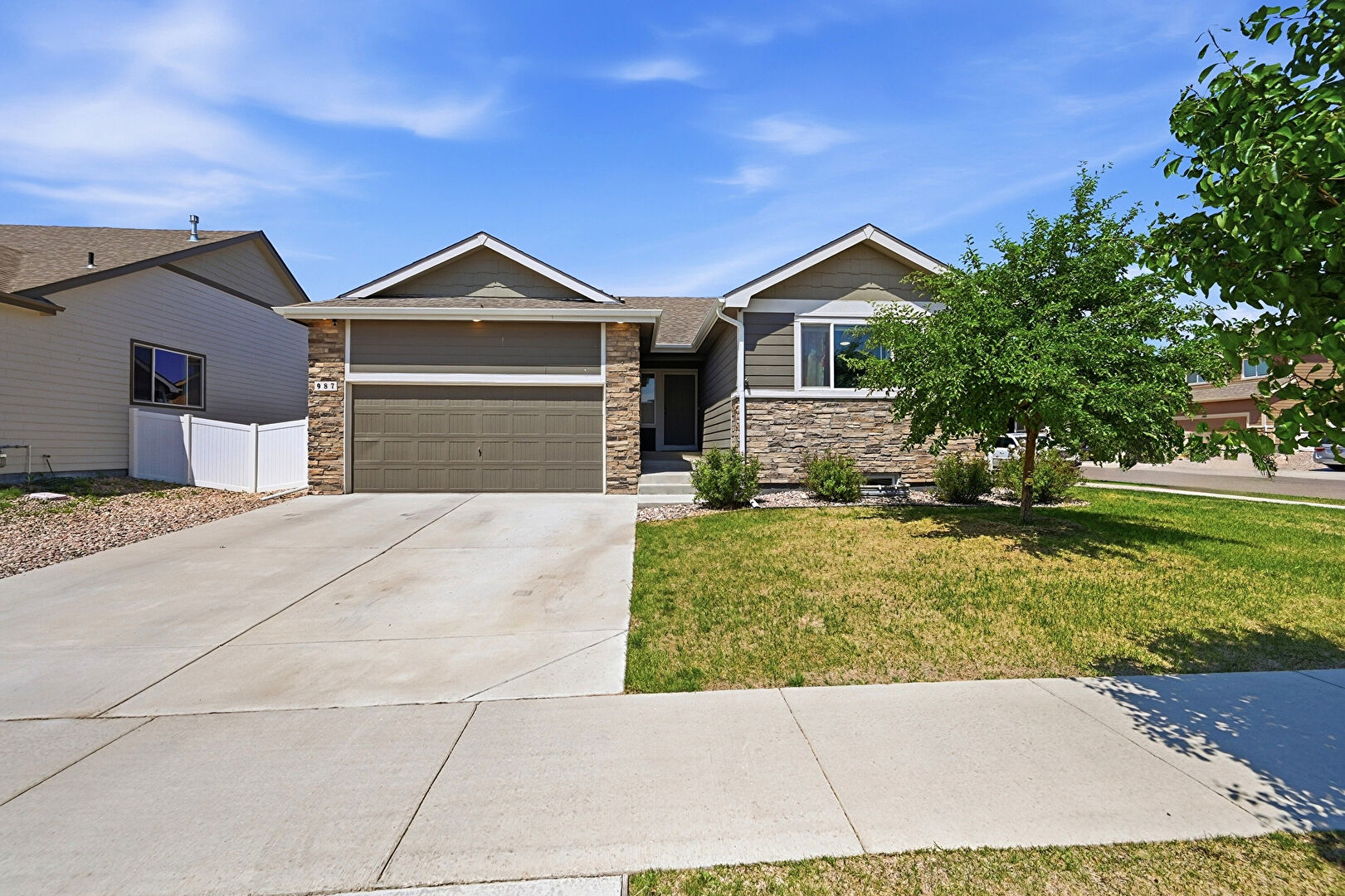 Front at 987 Axis Drive, Severance, CO 80550, listed by Shannon Blesener