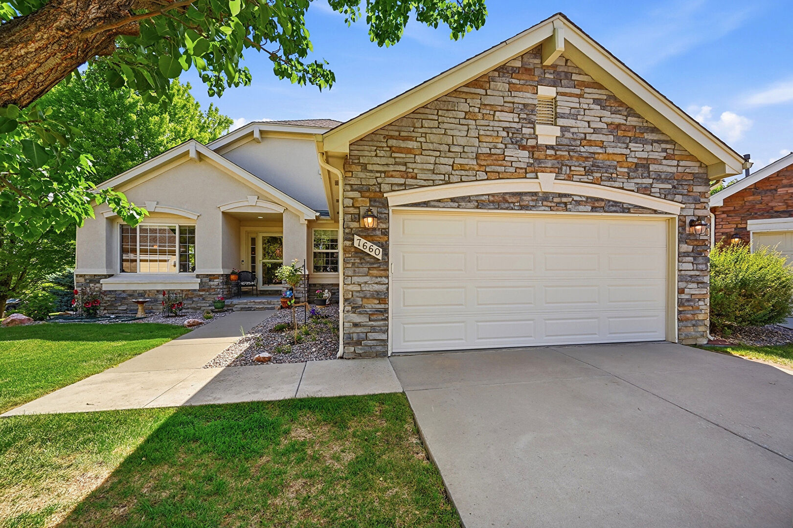 Front at 7660 Promontory Drive, Windsor, CO 80528, listed by Suzanne Ekeler