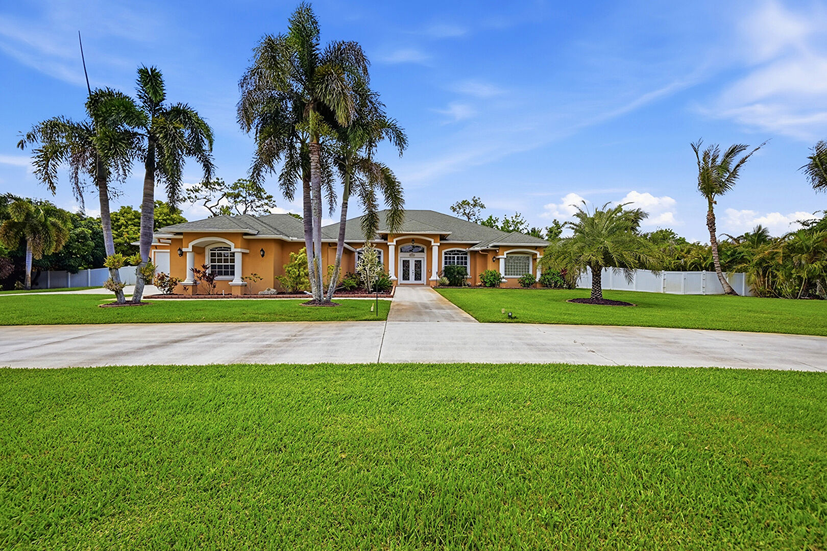 Front yard at 14310 85th Road North, Loxahatchee, FL 33470, listed by Stephen Snow, MLS ID: B26040426