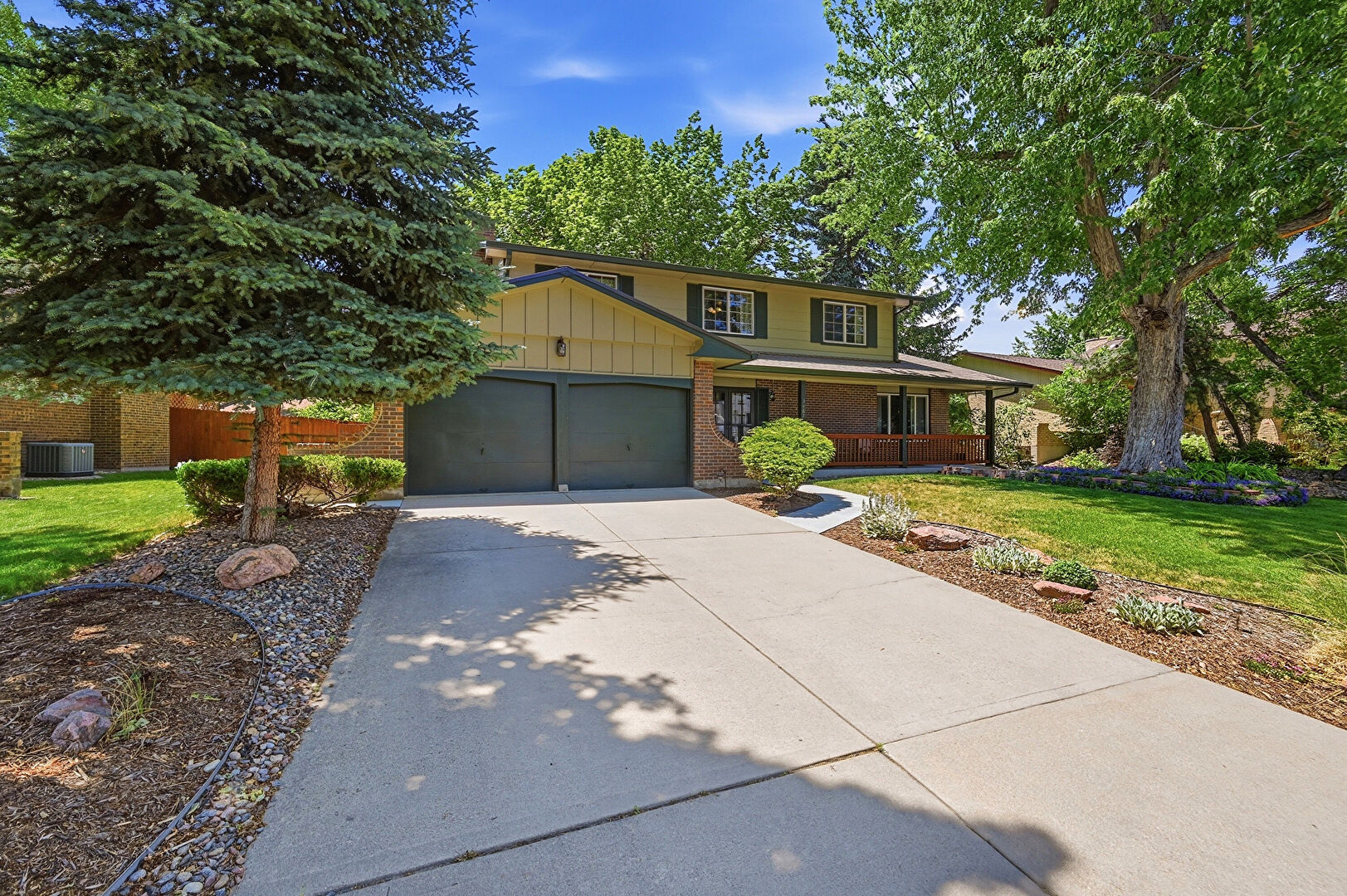 Front at 1487 South Macon Street, Aurora, CO 80012, listed by Mike & Ed Hardey