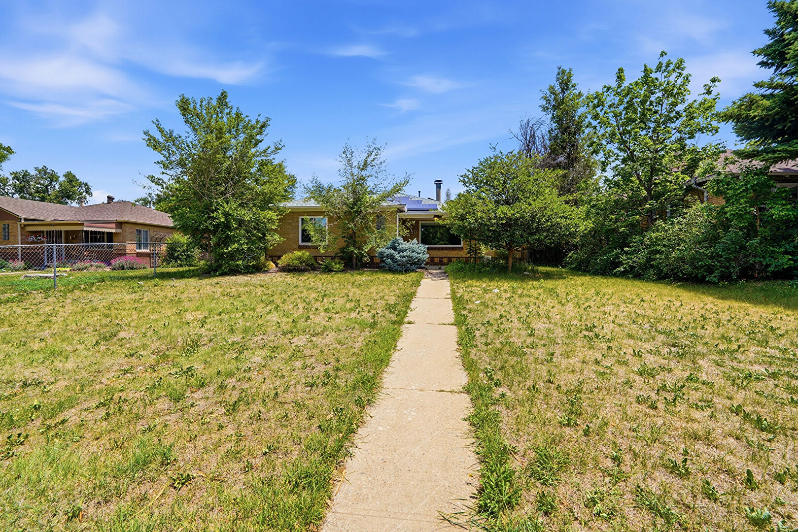 Front at 1560 Roslyn Street, Denver, CO 80220, listed by Taylor Haas