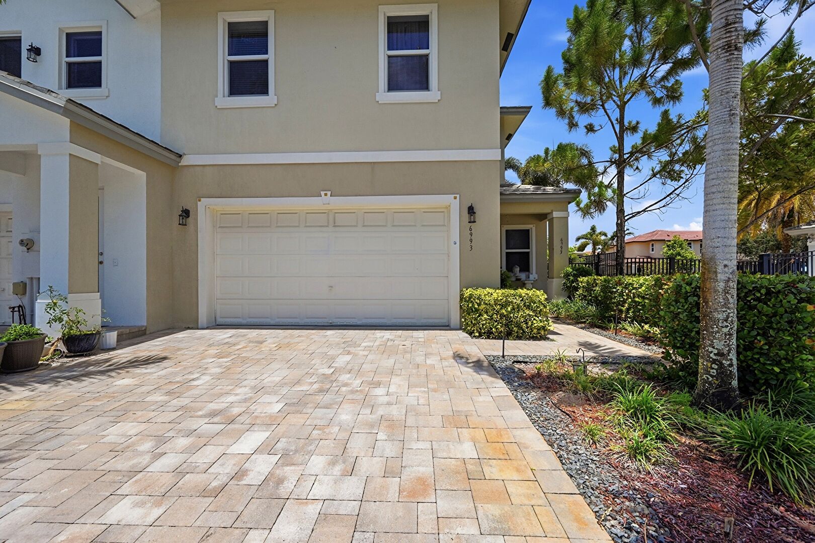 Front at 6993 Pines Circle, Coconut Creek, FL 33073, listed by Laura Sanders