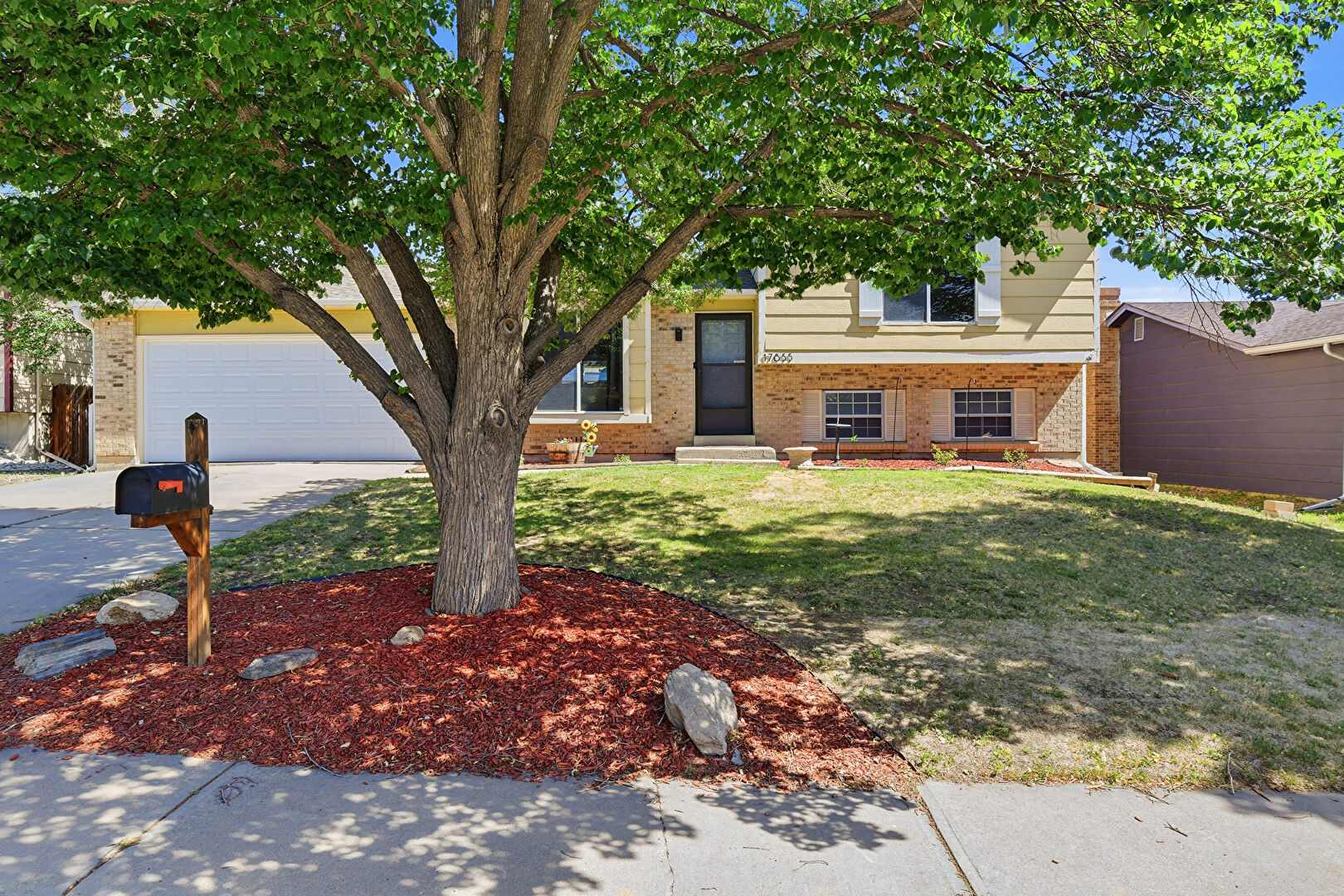 Front at 17855 East Kansas Place, Aurora, CO 80017, listed by Lillian Colbert